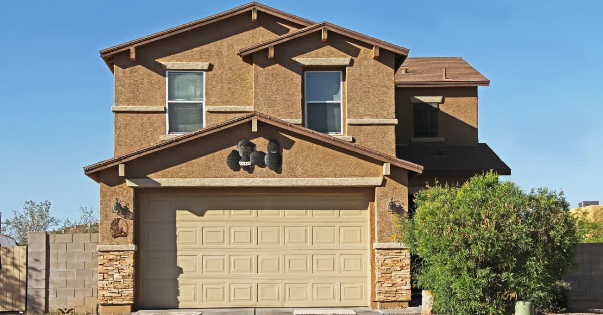 Affordable Arizona home with a tan garage